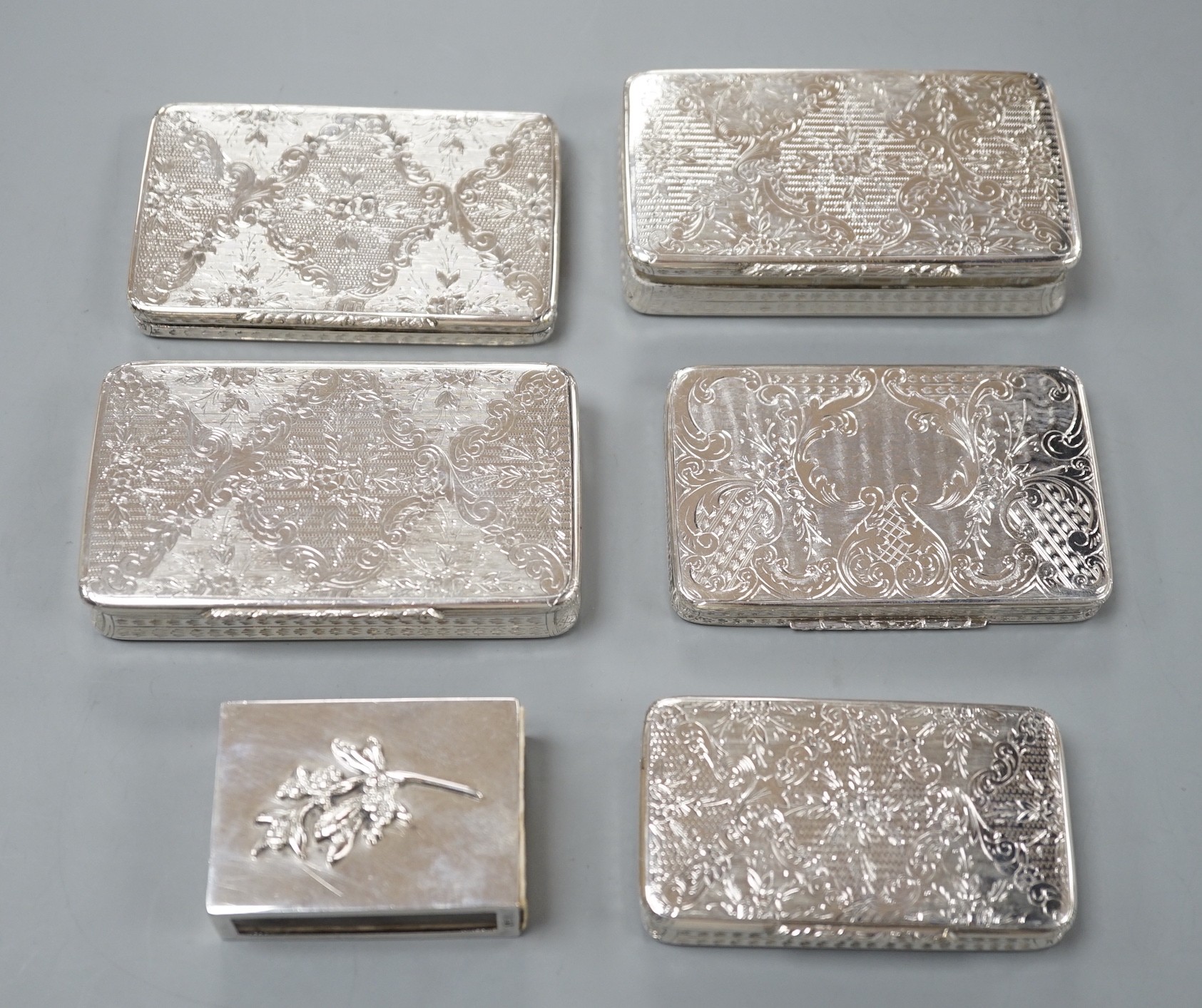 Five similar 20th century Spanish engraved white metal rectangular pill boxes, of varying sizes, largest 92mm and a 925 matchbox sleeve.